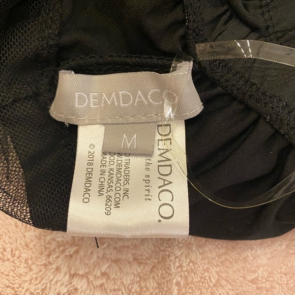 Peek a boo black shirt lengthener. - Picture 4 of 5